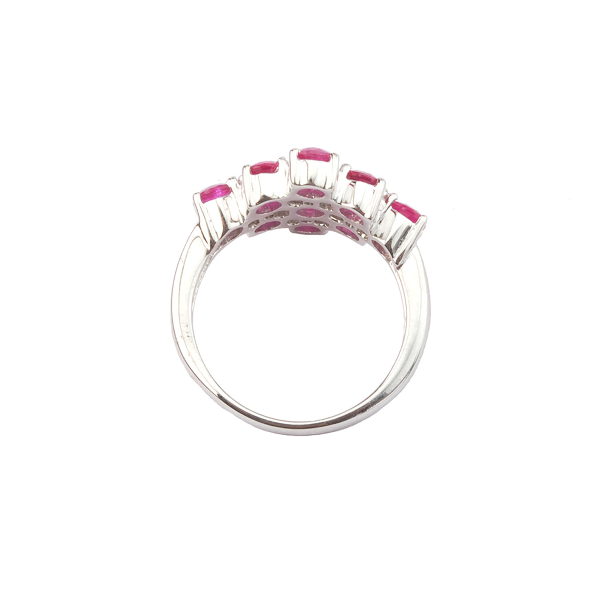 Oval rubies set in prongs in silver ring