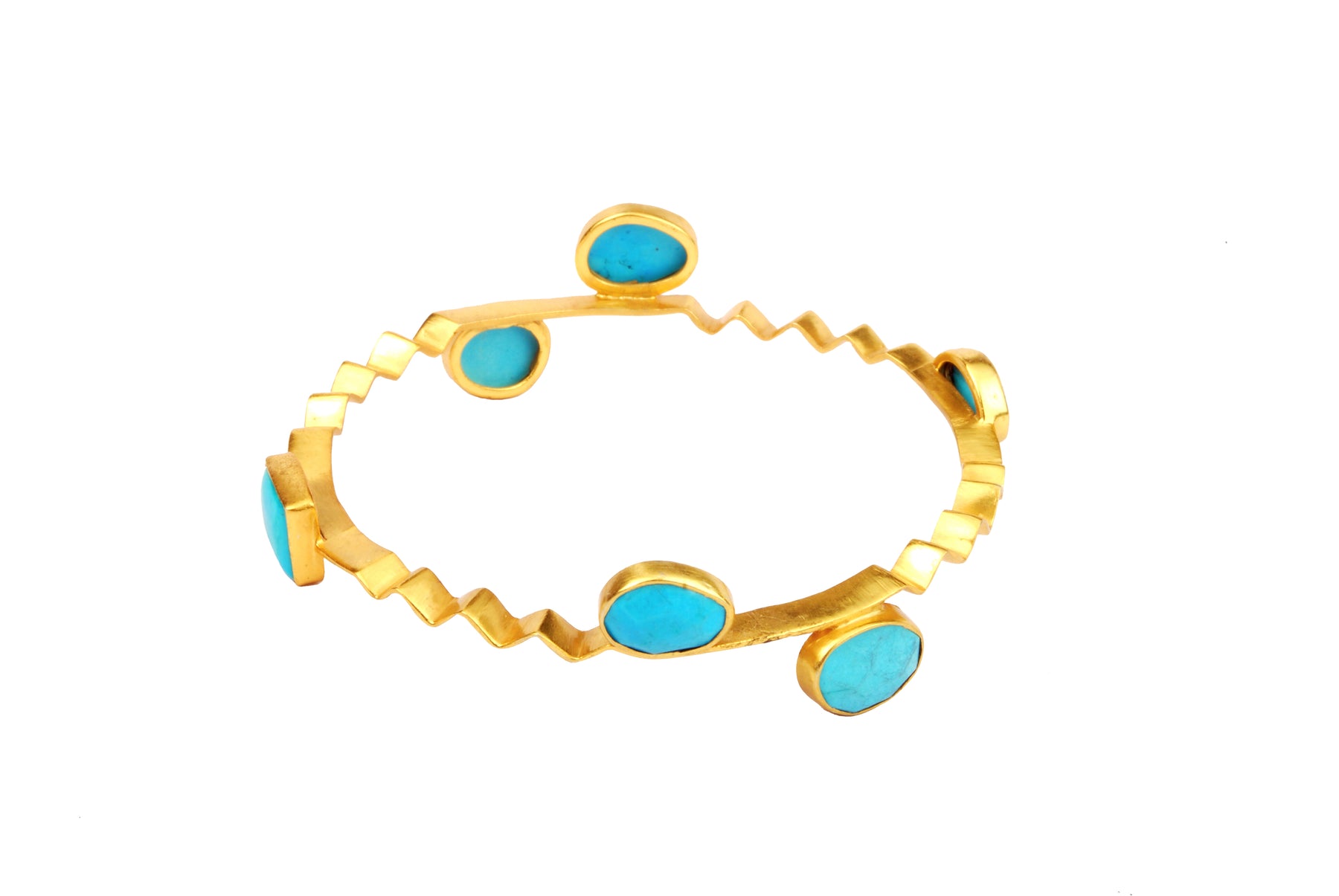 Different shaped turquoise in gold plated silver bangle